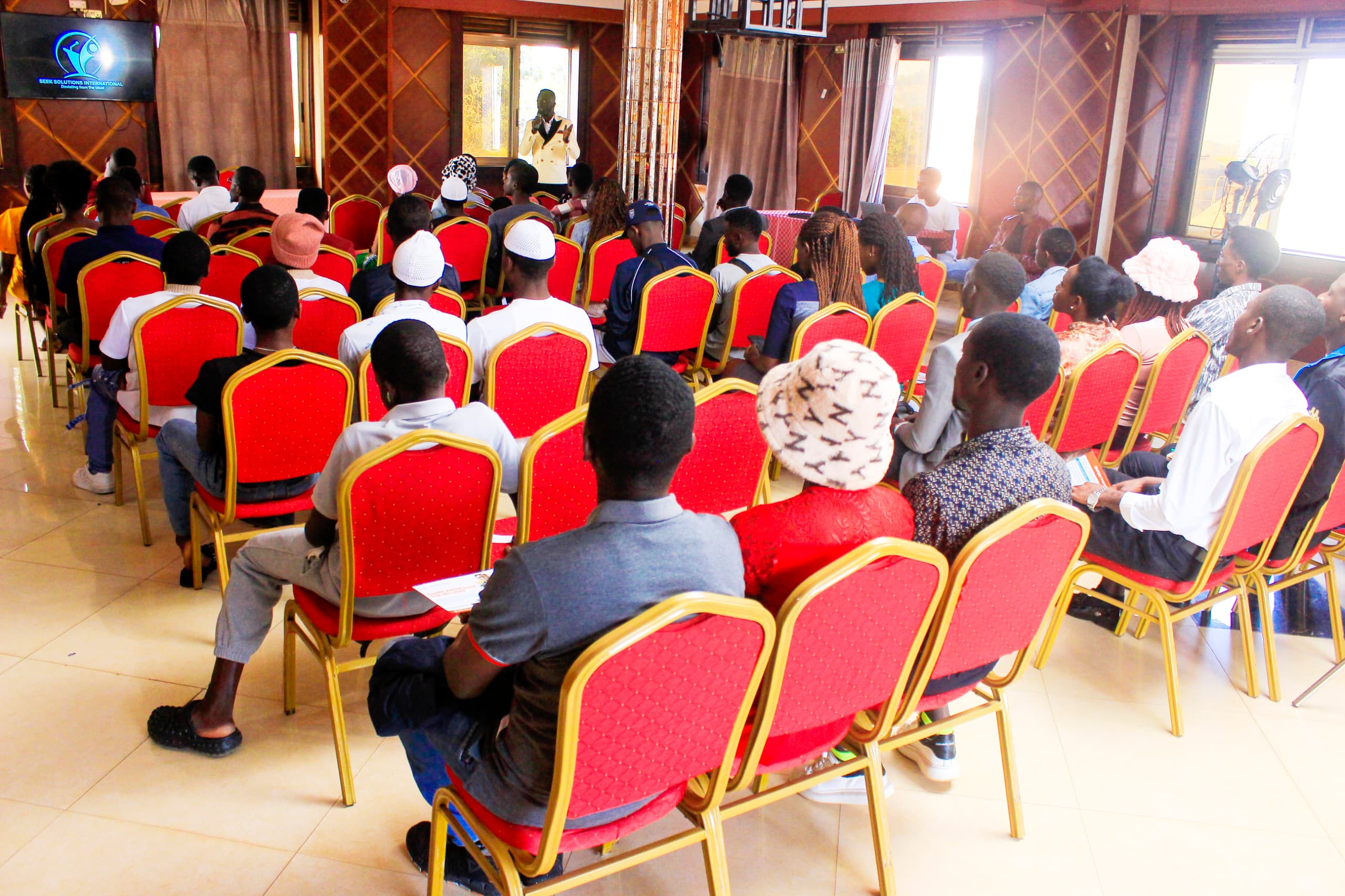 Youth and community members attending a training session